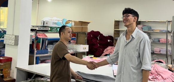 Shaking hands with a factory partner